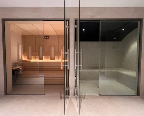Sauna con Infrarrojos Inbeca en nuestra solución Wellhome para el hogar acompañada de un baño de vapor.